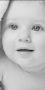 Geraint Edwards Photography image of baby girl with blanket